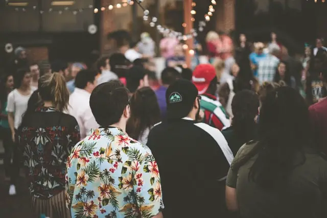 Image of students at an event, rushing a frat